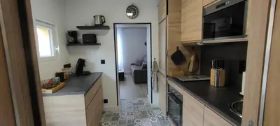 Cuisine ou kitchenette dans l'établissement Le petit chai