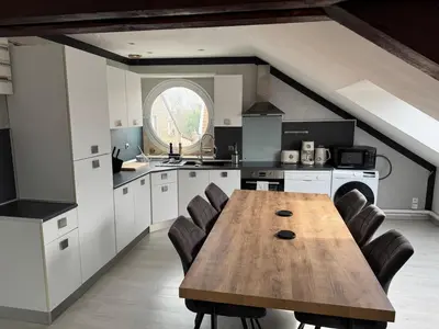 Cuisine ou kitchenette dans l'établissement L'Horizon Silencieux Loft