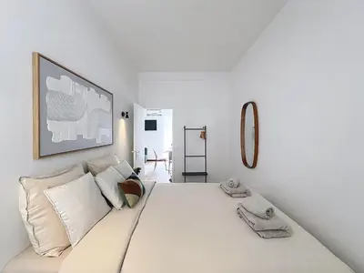 Un ou plusieurs lits dans un hébergement de l'établissement Le Noa - 2 Chambres - Climatisation - Terrasse