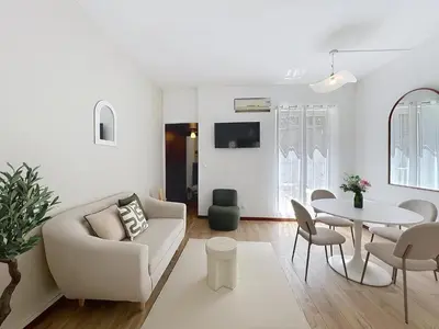 Télévision ou salle de divertissement dans l'établissement Le Noa - 2 Chambres - Climatisation - Terrasse