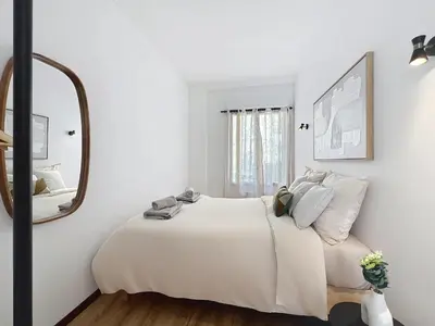Un ou plusieurs lits dans un hébergement de l'établissement Le Noa - 2 Chambres - Climatisation - Terrasse