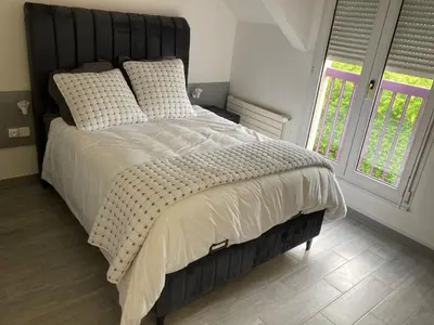 Un ou plusieurs lits dans un hébergement de l'établissement HSH France Chambre City 3 Proche de Disney