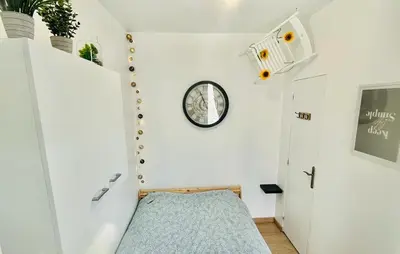 Un ou plusieurs lits dans un hébergement de l'établissement Chavalliaud 13 superbe appartement a l'envers