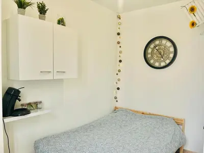 Un ou plusieurs lits dans un hébergement de l'établissement Chavalliaud 13 superbe appartement a l'envers