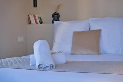Un ou plusieurs lits dans un hébergement de l'établissement Saint-Marceaux - Climatisation