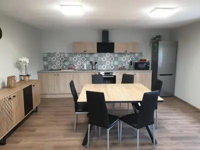 Cuisine ou kitchenette dans l'établissement Au Temps Suspendu