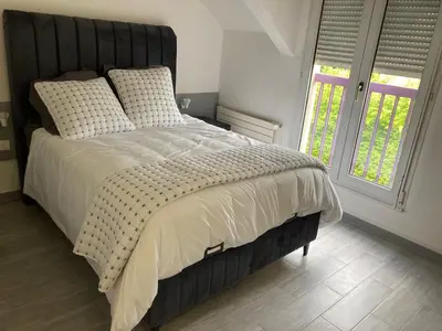 Un ou plusieurs lits dans un hébergement de l'établissement HSH France Chambre City 6 Proche de Disney