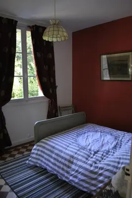 Un ou plusieurs lits dans un hébergement de l'établissement Gîte du Château des Chaînées