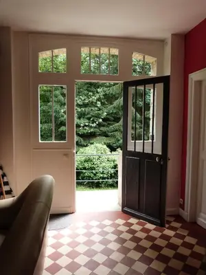 Coin salon dans l'établissement Gîte du Château des Chaînées
