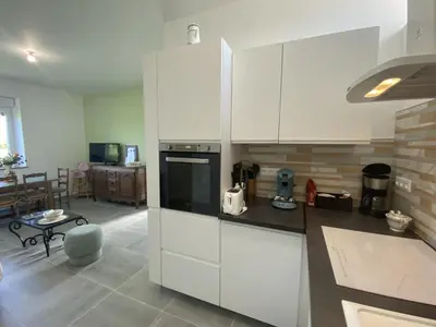 Cuisine ou kitchenette dans l'établissement Le marcquis