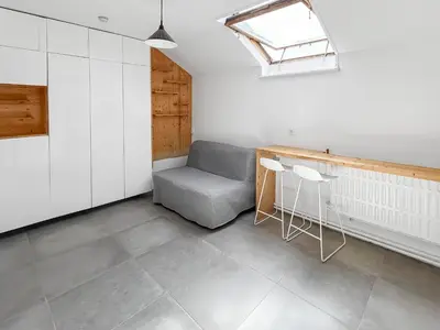 Coin salon dans l'établissement Studio lumineux et cosy, proche sites touristiques