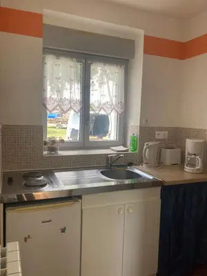Cuisine ou kitchenette dans l'établissement Jolie petite maison de campagne
