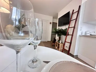 Télévision ou salle de divertissement dans l'établissement La détente de Robinson T2 agréable proche centre