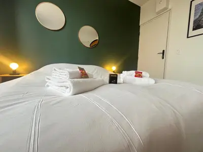 Un ou plusieurs lits dans un hébergement de l'établissement Neufchâtel studio cosy calme proche centre ville