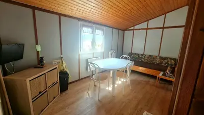 Télévision ou salle de divertissement dans l'établissement Chalet LE CORPIAS
