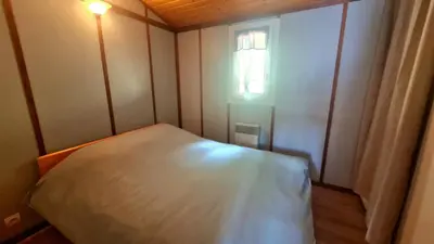 Un ou plusieurs lits dans un hébergement de l'établissement Chalet LE CORPIAS