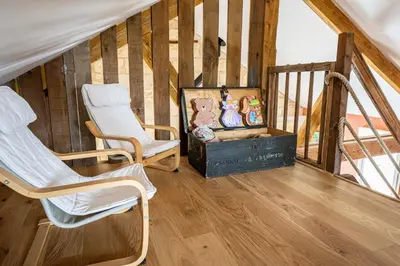 Coin salon dans l'établissement Gite à la ferme, authentique & accessible PMR