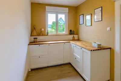 Cuisine ou kitchenette dans l'établissement La Richaumoise - Maison avec grand jardin