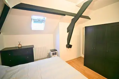 Un ou plusieurs lits dans un hébergement de l'établissement Casa Duplex Hirson
