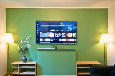 Télévision ou salle de divertissement dans l'établissement Casa Duplex Hirson