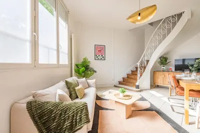 Coin salon dans l'établissement Maison Zola - 4 chambres chaleureuses