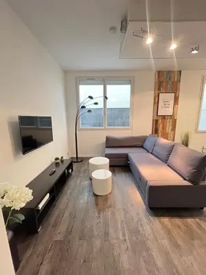 Télévision ou salle de divertissement dans l'établissement Vilnius - Confort familial