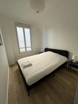 Un ou plusieurs lits dans un hébergement de l'établissement Vilnius - Confort familial