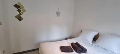 Un ou plusieurs lits dans un hébergement de l'établissement Iris centre-ville T2 rénové cocon cosy parking 35 m2
