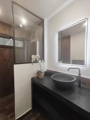 Salle de bains dans l'établissement Le Chalet Tropical