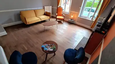 Coin salon dans l'établissement La maison du voyageur toque