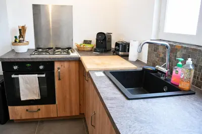 Cuisine ou kitchenette dans l'établissement L'échappée belle Trilportaise - 25 min Disneyland - wifi gratuit- Streaming gratuit