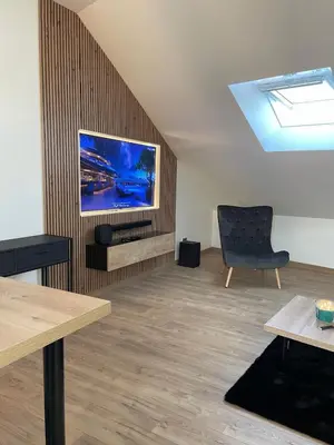 Télévision ou salle de divertissement dans l'établissement La Parenthèse Rémoise