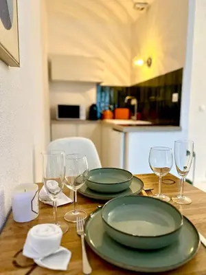 Cuisine ou kitchenette dans l'établissement Cocon Rémois avec parking privé