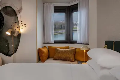 Un ou plusieurs lits dans un hébergement de l'établissement Hyatt Centric Reims