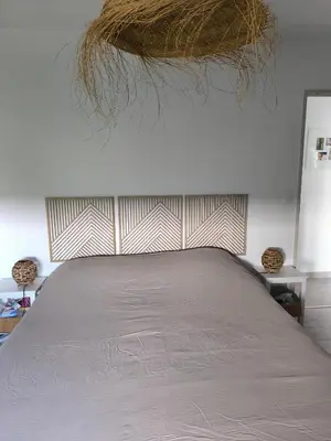 Un ou plusieurs lits dans un hébergement de l'établissement Maison 4 chambres
