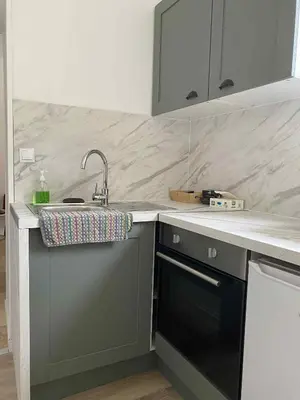 Cuisine ou kitchenette dans l'établissement T2 Cosy Spa & Sauna