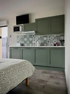 Cuisine ou kitchenette dans l'établissement L'Escale de la Râperie, logement 3
