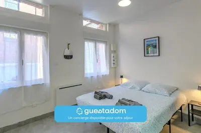 Un ou plusieurs lits dans un hébergement de l'établissement Jacmel - 5min Centre Ville - Wifi