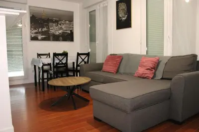Coin salon dans l'établissement Très bel appartement - Meaux - proche Disneyland
