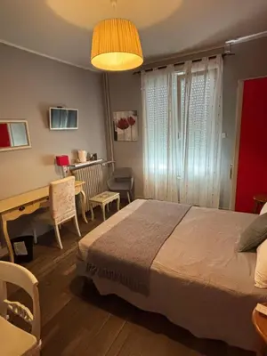 Un ou plusieurs lits dans un hébergement de l'établissement Hôtel Le Pont de l'Aube