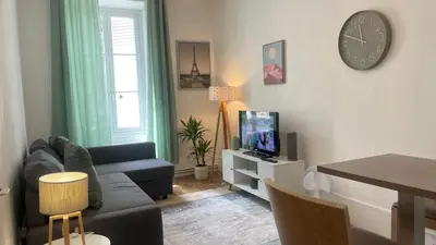 Télévision ou salle de divertissement dans l'établissement MEAUX Centre Vue Cathédrale RDC Cosy