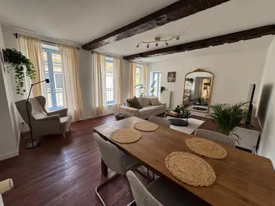 Coin salon dans l'établissement Appartement Sedan