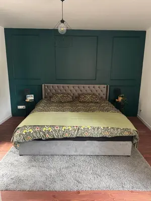 Coin salon dans l'établissement Appartement Sedan