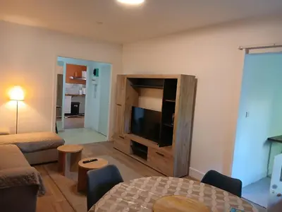 Télévision ou salle de divertissement dans l'établissement Spacieux et Confortable
