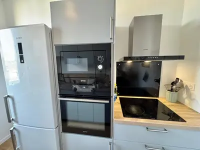 Cuisine ou kitchenette dans l'établissement Le Royal Eight Cœur de Reims
