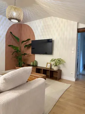 Télévision ou salle de divertissement dans l'établissement La Rosa