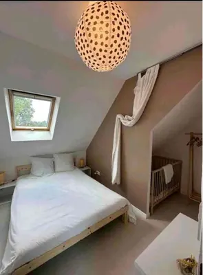 Un ou plusieurs lits dans un hébergement de l'établissement Pool House Champêtre