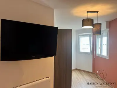 Télévision ou salle de divertissement dans l'établissement Le loft de la gare - Hypercentre et vue cathédrale