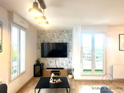 Télévision ou salle de divertissement dans l'établissement Le loft de la gare - Hypercentre et vue cathédrale