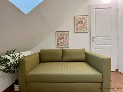 Coin salon dans l'établissement Le nid Rémois -Pied à terre en champagne